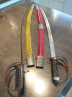 2 zwaarden met koker, Ophalen