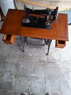 Antieke naaimachine, Ophalen