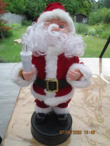 Père Noël décoratif, lumière, musique                       beschikbaar voor biedingen