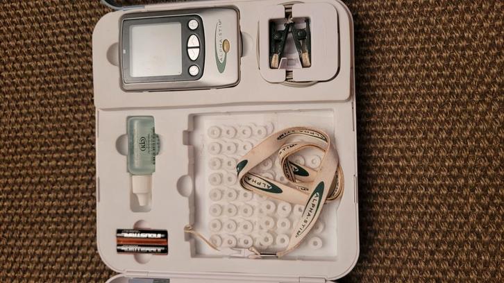 Alpha-Stim Aid - rust, focus en beter slapen, Boeken, Gezondheid, Dieet en Voeding, Zo goed als nieuw, Ophalen of Verzenden