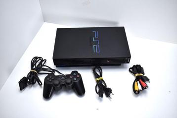 La console PS2 avec manette Dualshock 2 fonctionne parfaitem