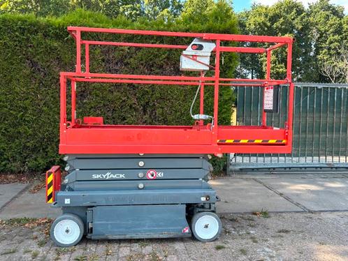 Skyjack SJIII3219 hoogwerker schaarhoogwerker 8m skyjack, Zakelijke goederen, Machines en Bouw | Liften, Steigers en Ladders