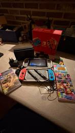 Nintendo Switch rood/blauw, Games en Spelcomputers, Ophalen, Met games, Met 2 controllers, Zo goed als nieuw