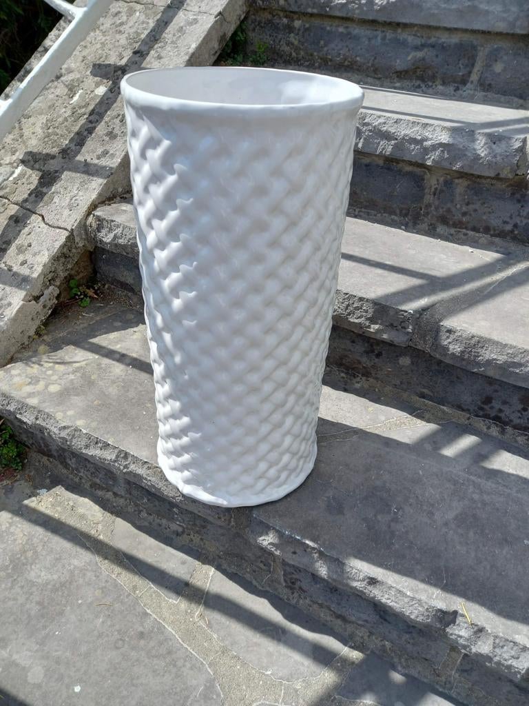 Parapluhouder., Ophalen