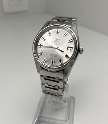 vintage Orient Japan Automatic met originele stalen band disponible aux enchères