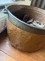 Koperen houtbak, Ophalen