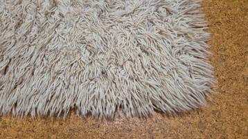Langharig beige tapijt 200x300cm van zuiver scheerwol beschikbaar voor biedingen