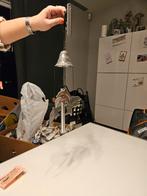 Windgong met dolfijnen, Ophalen