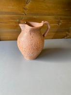 Kruik in aardewerk, Ophalen