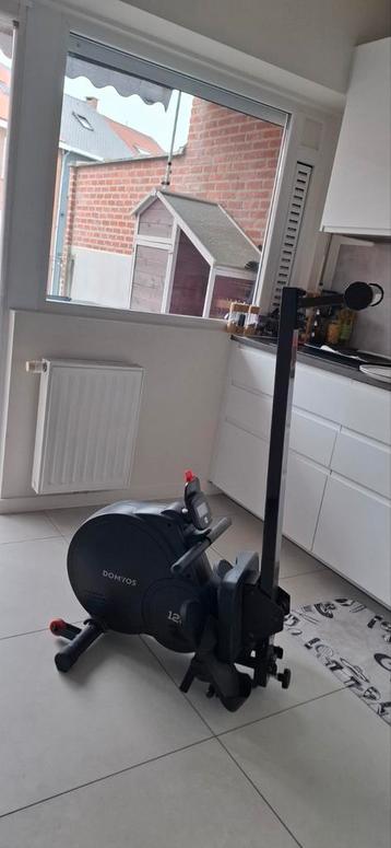 Roeimachine en vloerbescherming beschikbaar voor biedingen