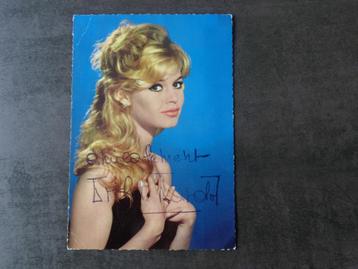 Oude kleurenfoto met toewijding van Brigitte Bardot