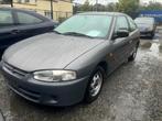 Mitsubishi colt 1.3 benzine bj 1999 km 141.000 airco 1600€, Stof, Zwart, Colt, Bedrijf