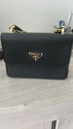 Prada tas, Ophalen, Zo goed als nieuw