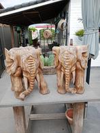 Massief houten olifanten, Ophalen
