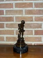 Bronzen beeldje, Ophalen, Brons