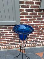 Staander met kelk voor bloemen, Ophalen