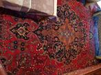 Mooi en groot Iraans tapijt, Ophalen