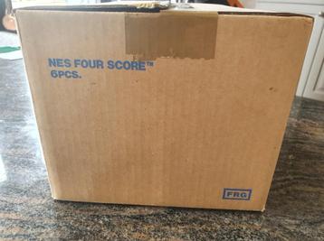Boîte scellée contenant 6 jeux Nintendo NES Four Scores NOS 