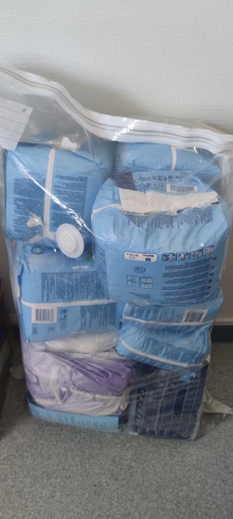 Lot de 9 packs Tena Pant's incontinence hommes et femmes, Diversen, Verpleegmiddelen, Nieuw, Ophalen