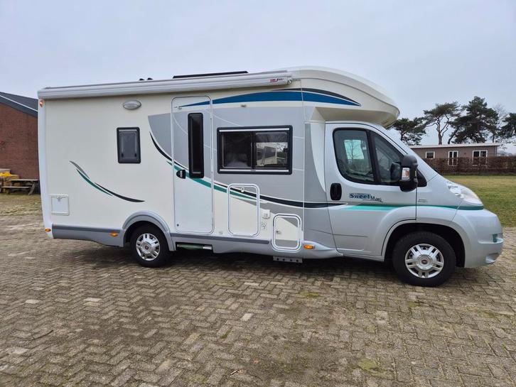 Unieke camper met hefbed ( 38448 km ! ) in Holland, Caravans en Kamperen, Mobilhomes, Particulier, tot en met 4, Half-integraal