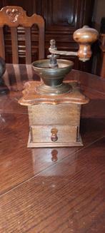 antieke koffiemolen, Ophalen