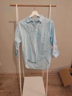 Blouse rayée Zara, Enlèvement