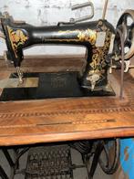 Machine à coudre, Ophalen