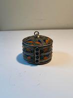 Berbers amulet doosje, Ophalen