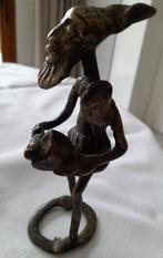 Bronzen afrikaans beeldje, Ophalen