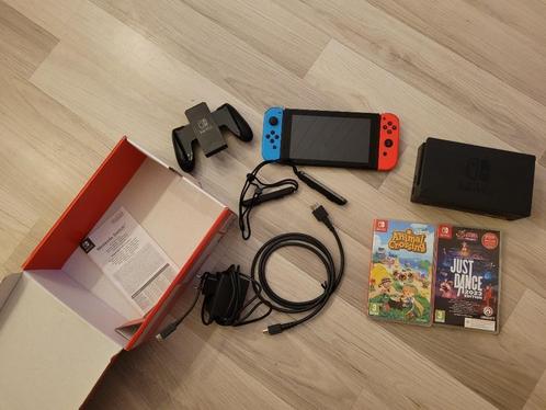 nintendo switch console + 2 spelletjes, Games en Spelcomputers, Spelcomputers | Nintendo Switch, Gebruikt, Switch Original, Met 2 controllers