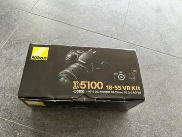 canon D5100 met statief en accessoires beschikbaar voor biedingen