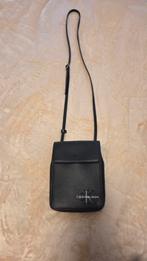 Calvin klein zwarte tas, Ophalen