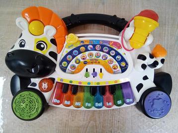 Jouet Vtech Piano jungle rock disponible aux enchères