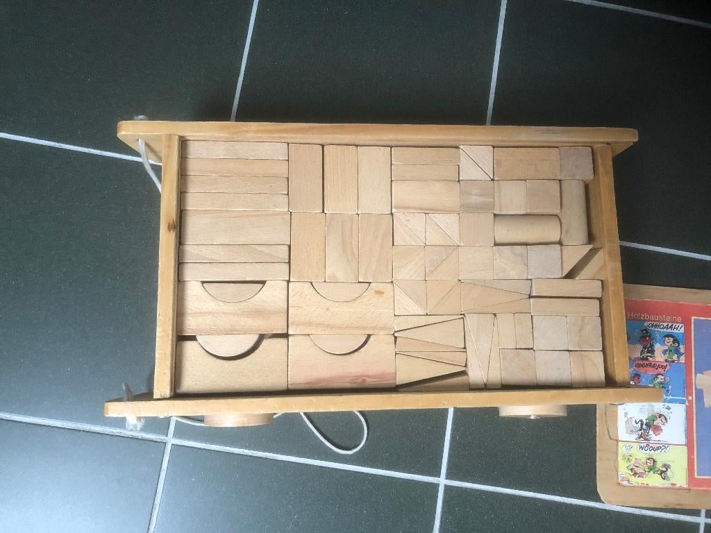Houten speelgoed, Ophalen