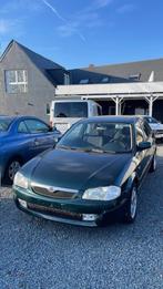 Mazda 323 Benzine 1.8 Airco 122000km, Autos, Mazda, Boîte manuelle, Vitres électriques, Vert, Berline