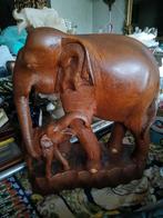 Houten olifant met baby, Ophalen