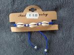 Koningsblauwe gevlochten armband met schelpen en parels NIEU, Ophalen of Verzenden, Nieuw, Blauw, Overige materialen