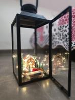 Kerstversiering met lichtjes, Ophalen