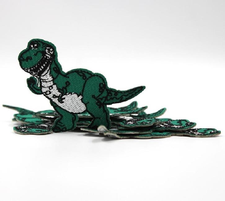 Dino strijkplaatje patch kinderen - 65 x 60 mm, Hobby en Vrije tijd, Kledingapplicaties en Hotfix, Nieuw, Ophalen of Verzenden