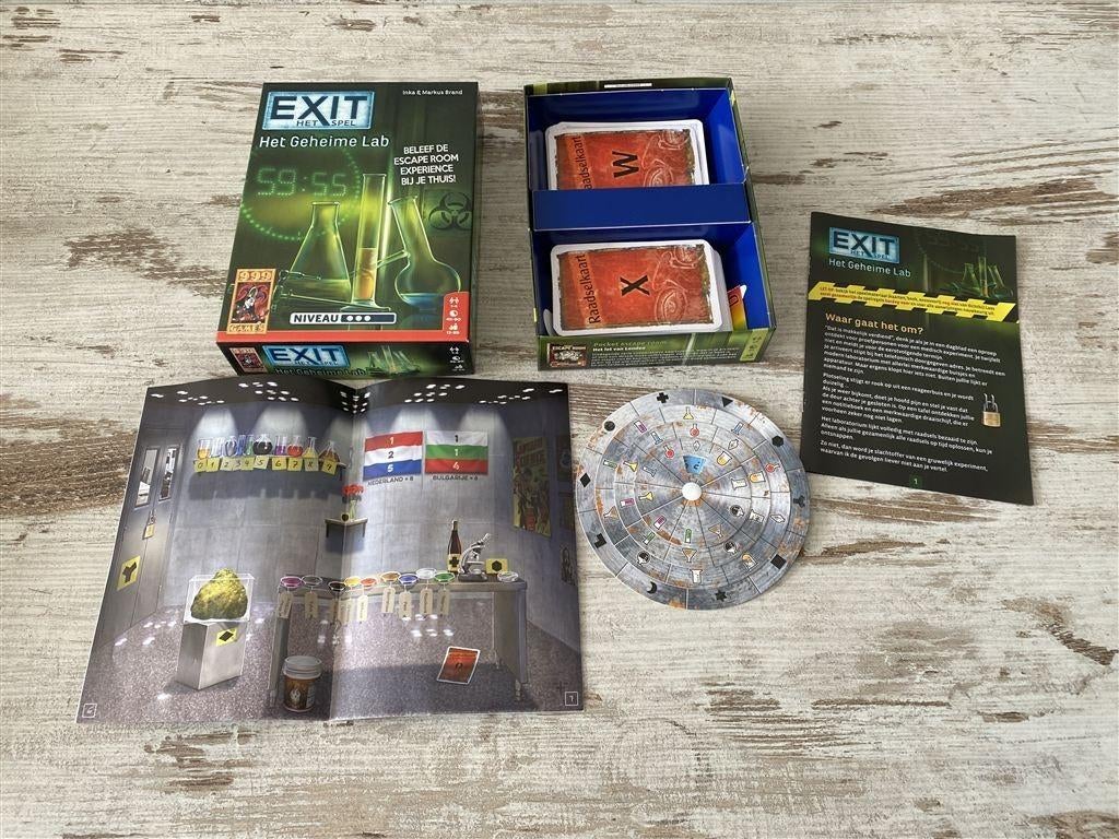 Exit het spel het geheime lab 999 games [s768], Hobby en Vrije tijd, Gezelschapsspellen | Bordspellen, Zo goed als nieuw, Verzenden