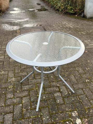 Ronde glazen tafel 90x70 beschikbaar voor biedingen