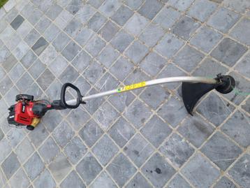 Benzine grastrimmer 2 takt werkend en goede staat.  beschikbaar voor biedingen