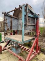 Kistenkantelaar, Ophalen