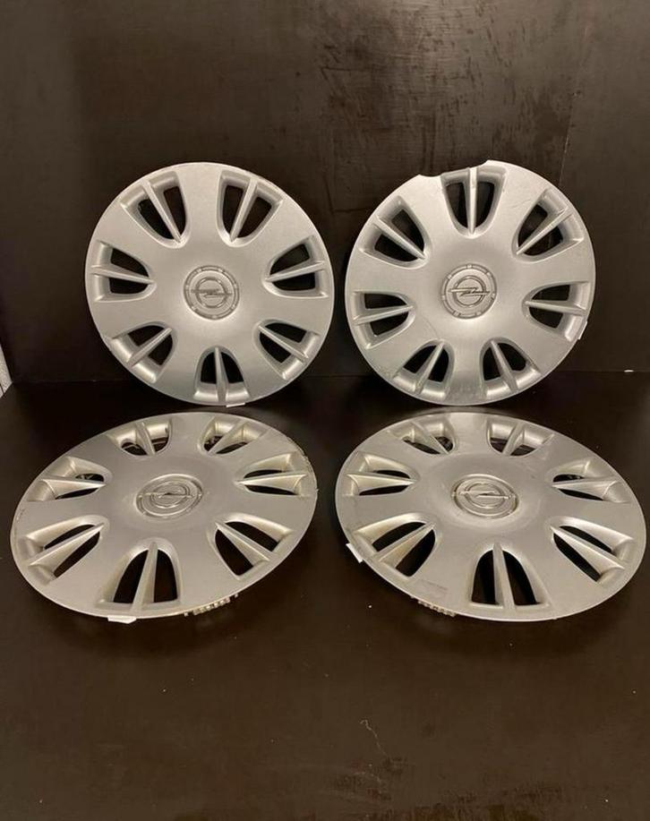 4 originele Opel corsa combo Astra 15" wieldoppen, Auto diversen, Wieldoppen, Gebruikt, Ophalen of Verzenden