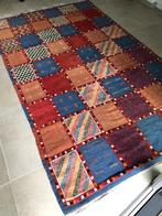 Handgeknoopt  Berber tapijt, Ophalen