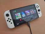 Nintendo Switch OLED + Accessoires, Games en Spelcomputers, Spelcomputers | Nintendo Switch, Ophalen, Zo goed als nieuw, Met 3 controllers of meer