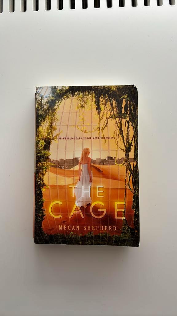 Megan Shepherd - The cage, Boeken, Kinderboeken | Jeugd | 13 jaar en ouder, Gelezen, Ophalen of Verzenden