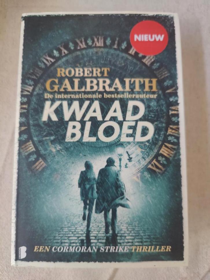 Robert Galbraith - Kwaad bloed, Boeken, Thrillers, Zo goed als nieuw, Ophalen of Verzenden