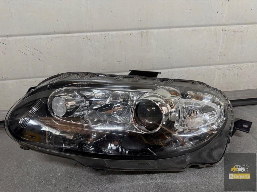 10061334, Mazda MX-5 NC Miata 2006 Linker voorlamp, Gebruikt, Shinchi, Fuchu-Cho 3-1
730-8670  Hiroshima, Mazda Motor Corporation