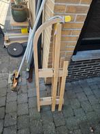 Houten slee te koop, Ophalen
